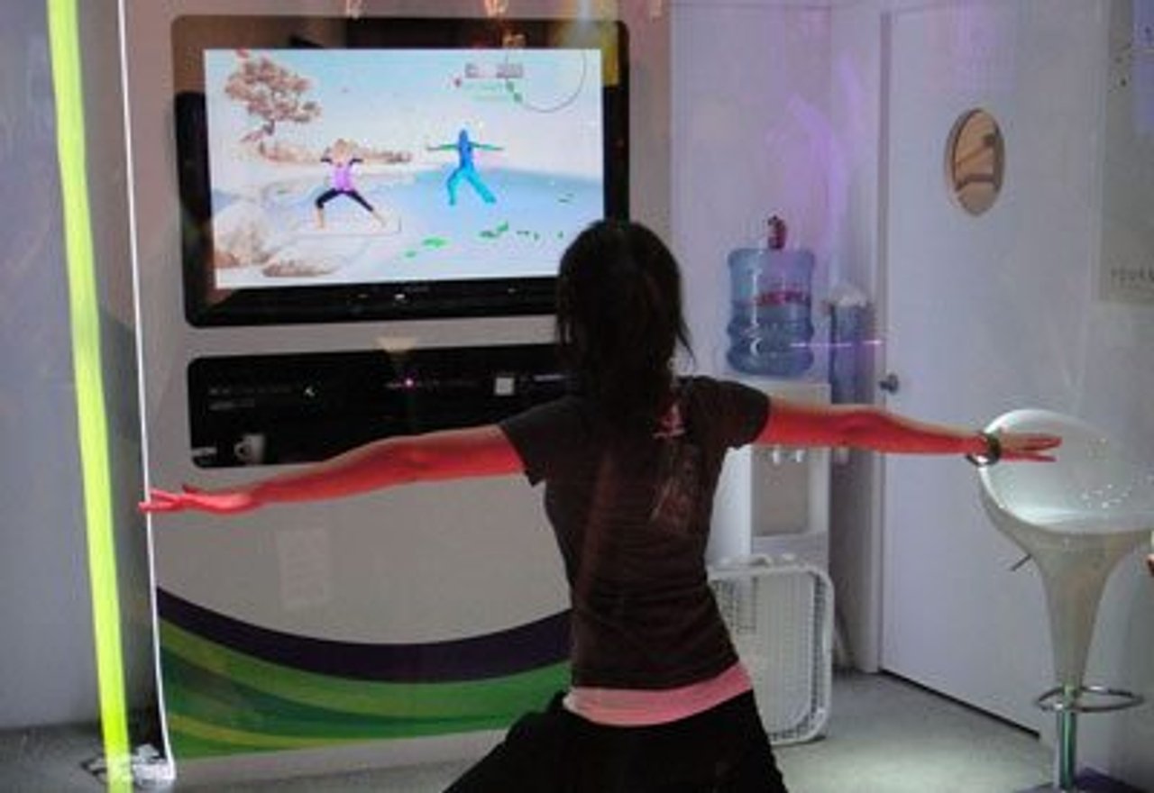 A young woman demonstrates why the Kinect is best used in the privacy of one's home (Image: popculturegeek.com)