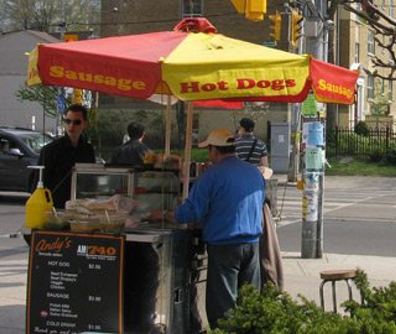 A hot dog vendor at the safer location of College and St. George (Image: Alfred Ng from TorontoLife.com Flickr Pool)
