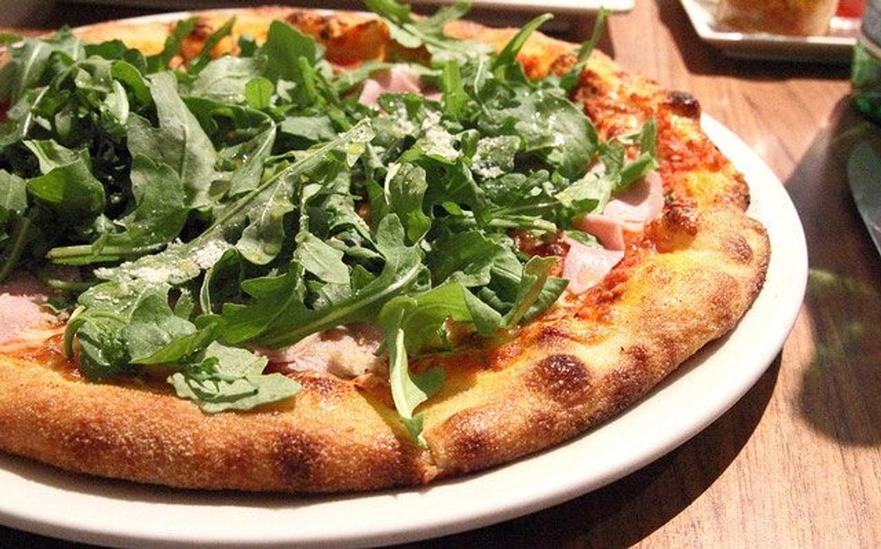 The prosciutto bianca comes buried in arugula (Image: Renée Suen)