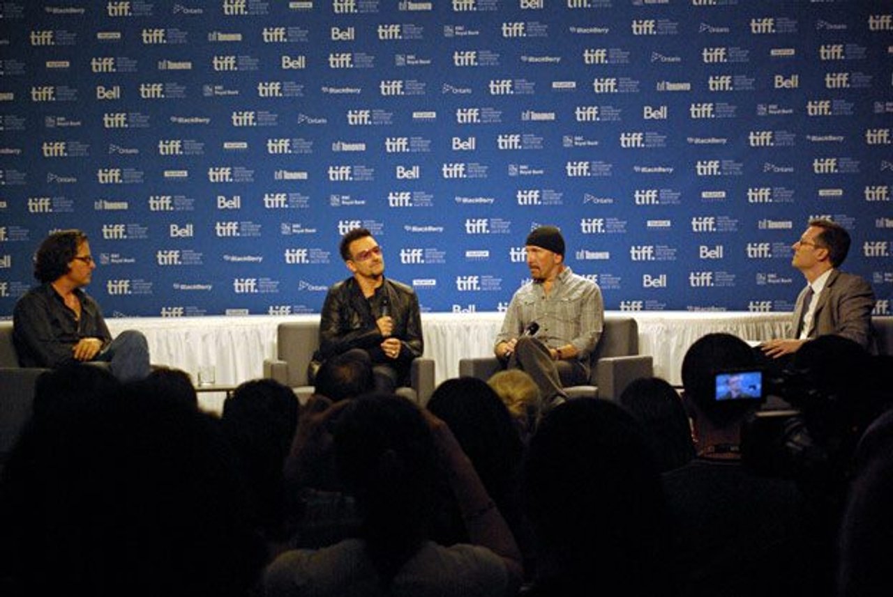 TIFF PHOTO GALLERY: Bono and The Edge get all reflective at the From the Sky Down press conference