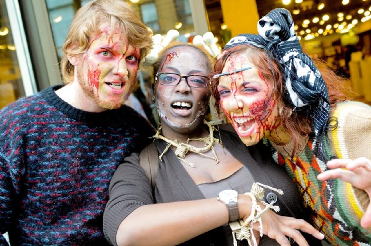 The Toronto Zombie Walk saw undead children and a wedding ceremony for a couple of brain eaters