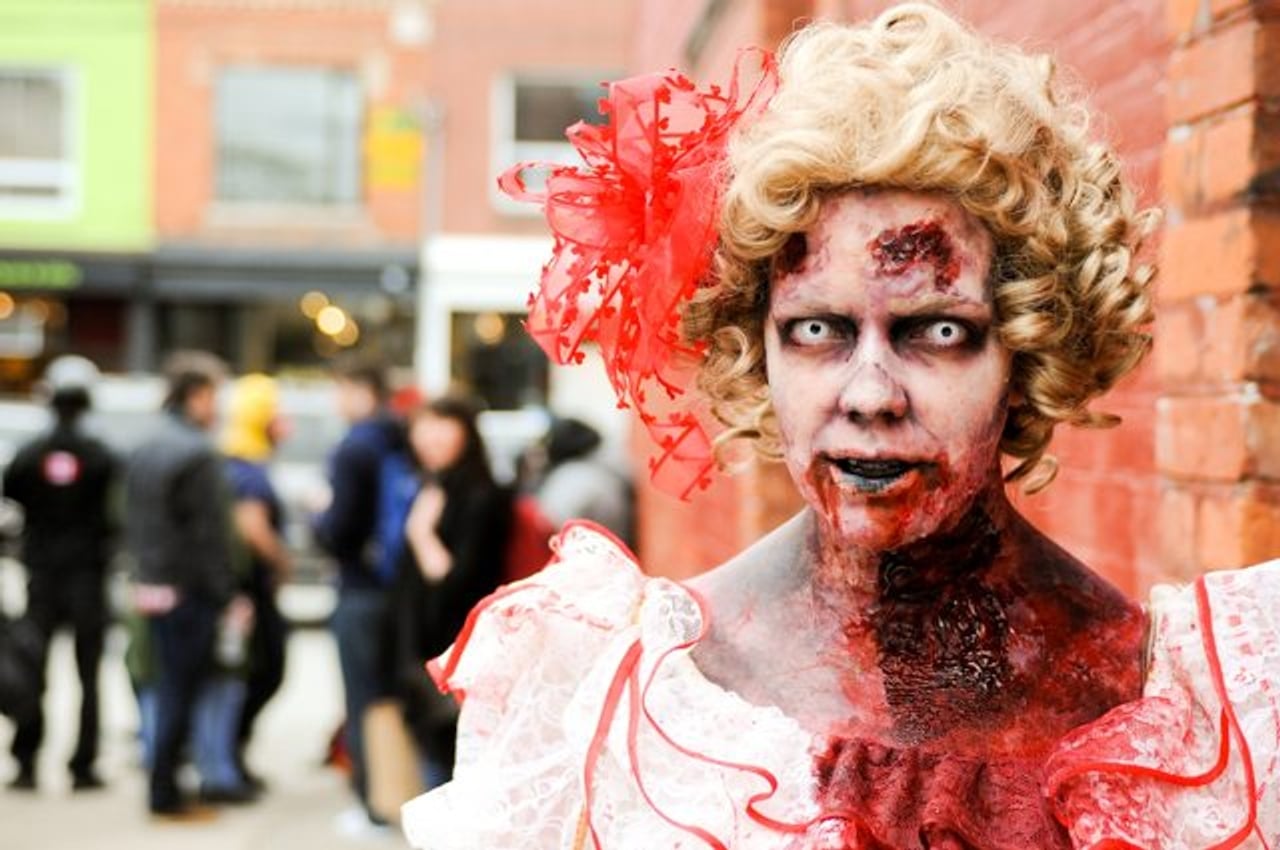 The Toronto Zombie Walk saw undead children and a wedding ceremony for a couple of brain eaters