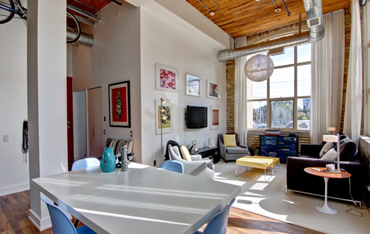 Condo of the Week: $375,000 for a Regent Park loft with big warehouse windows and a bigger private patio