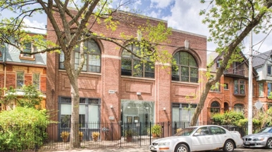 Condo of the Week: $760,000 for a two-level loft in Moss Park with a spiral staircase and a trap door