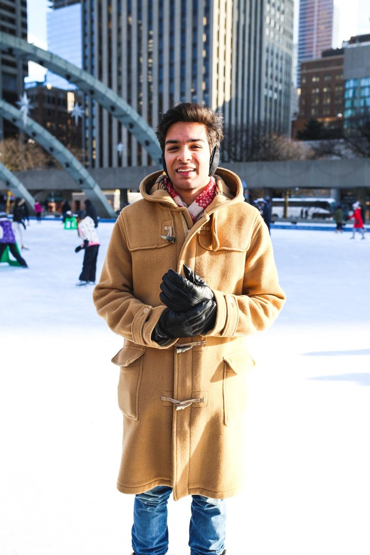 Street Style: bundled-up out-of-towners and students show off their ice-skating style at Nathan Phillips Square