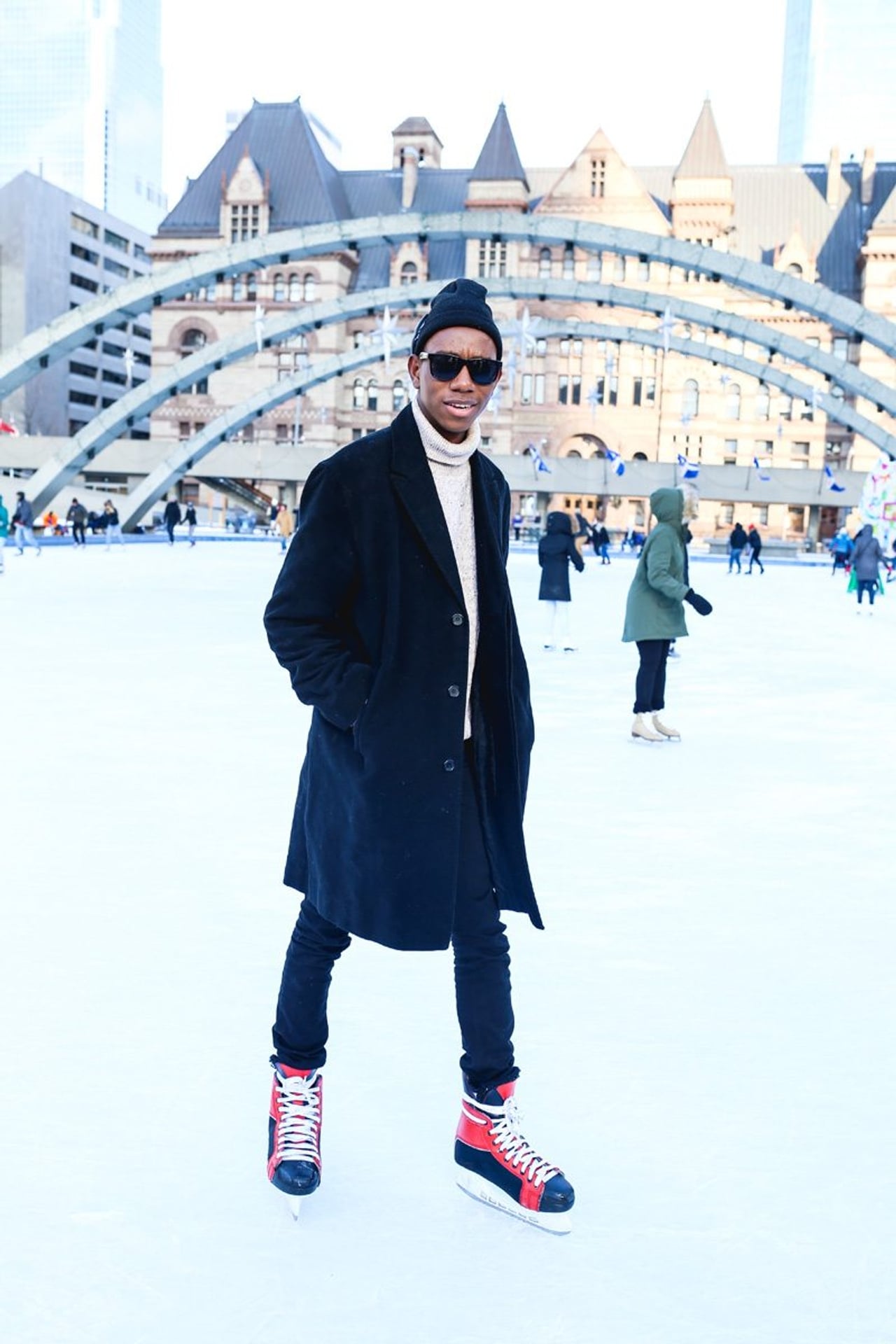 Street Style: bundled-up out-of-towners and students show off their ice-skating style at Nathan Phillips Square