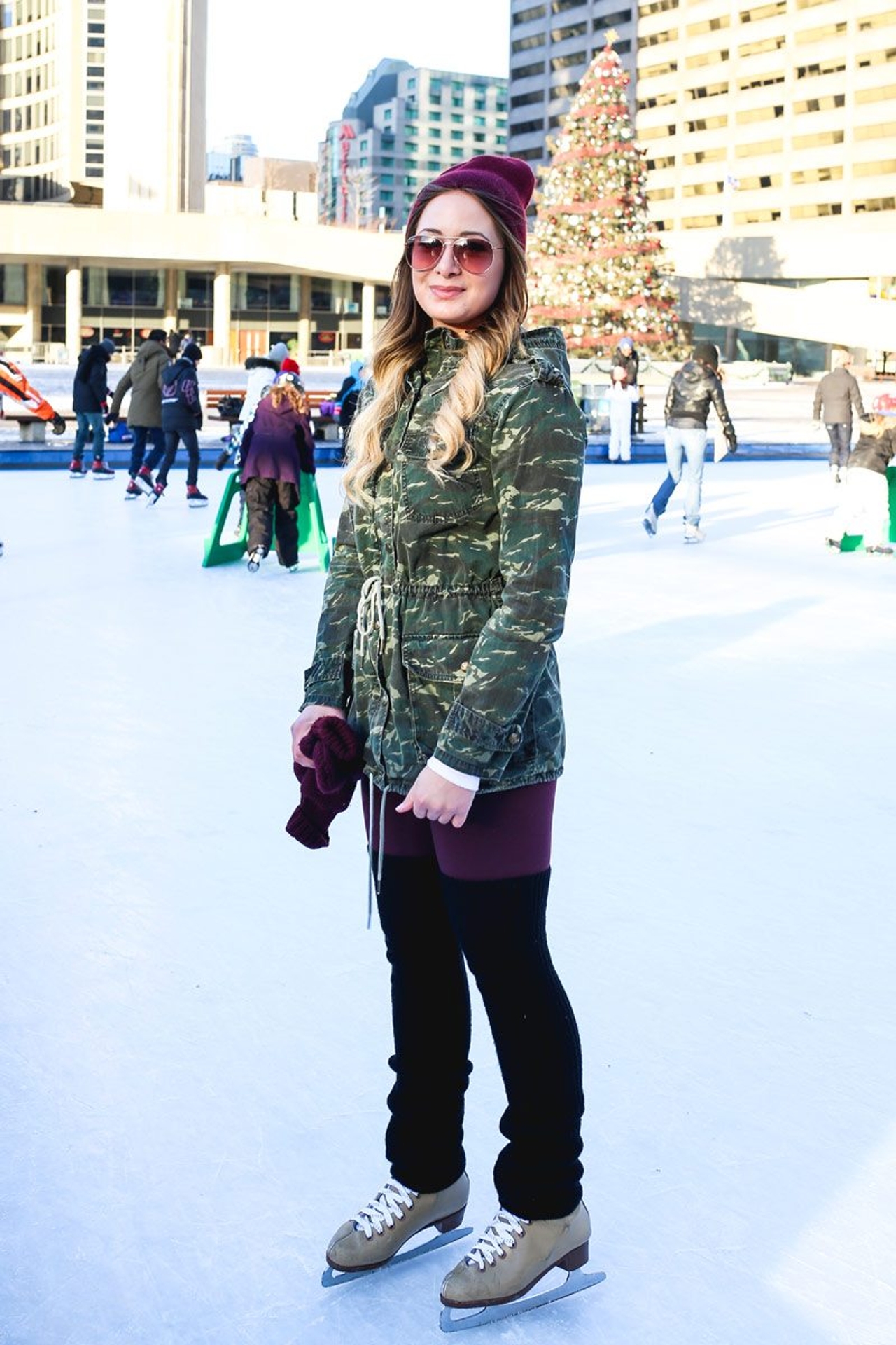 Street Style: bundled-up out-of-towners and students show off their ice-skating style at Nathan Phillips Square