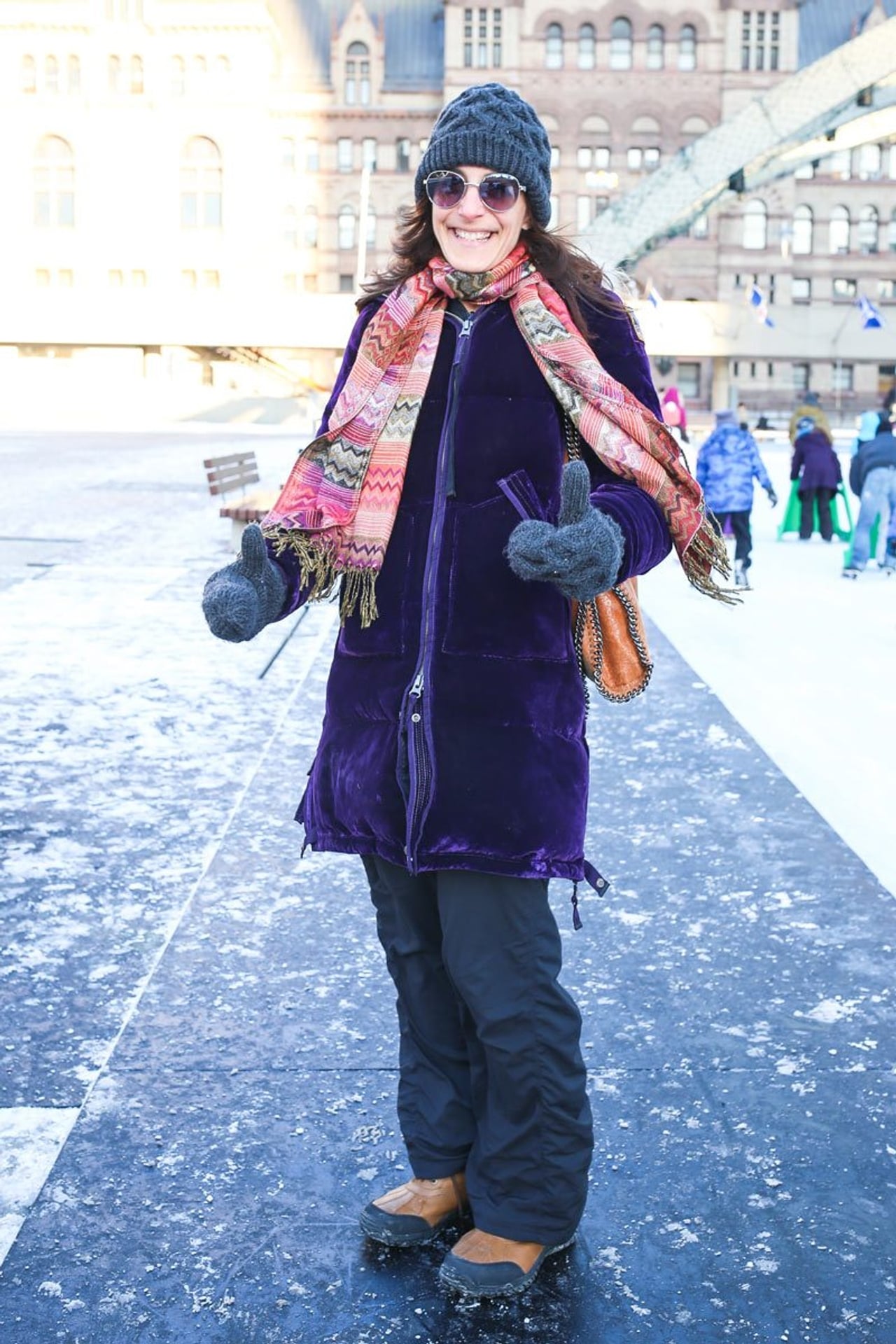 Street Style: bundled-up out-of-towners and students show off their ice-skating style at Nathan Phillips Square