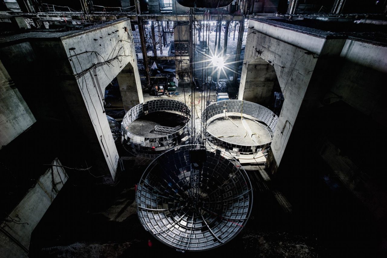 Here's how Luminato mounted a stunning eight-metre mirror ball inside an abandoned power plant