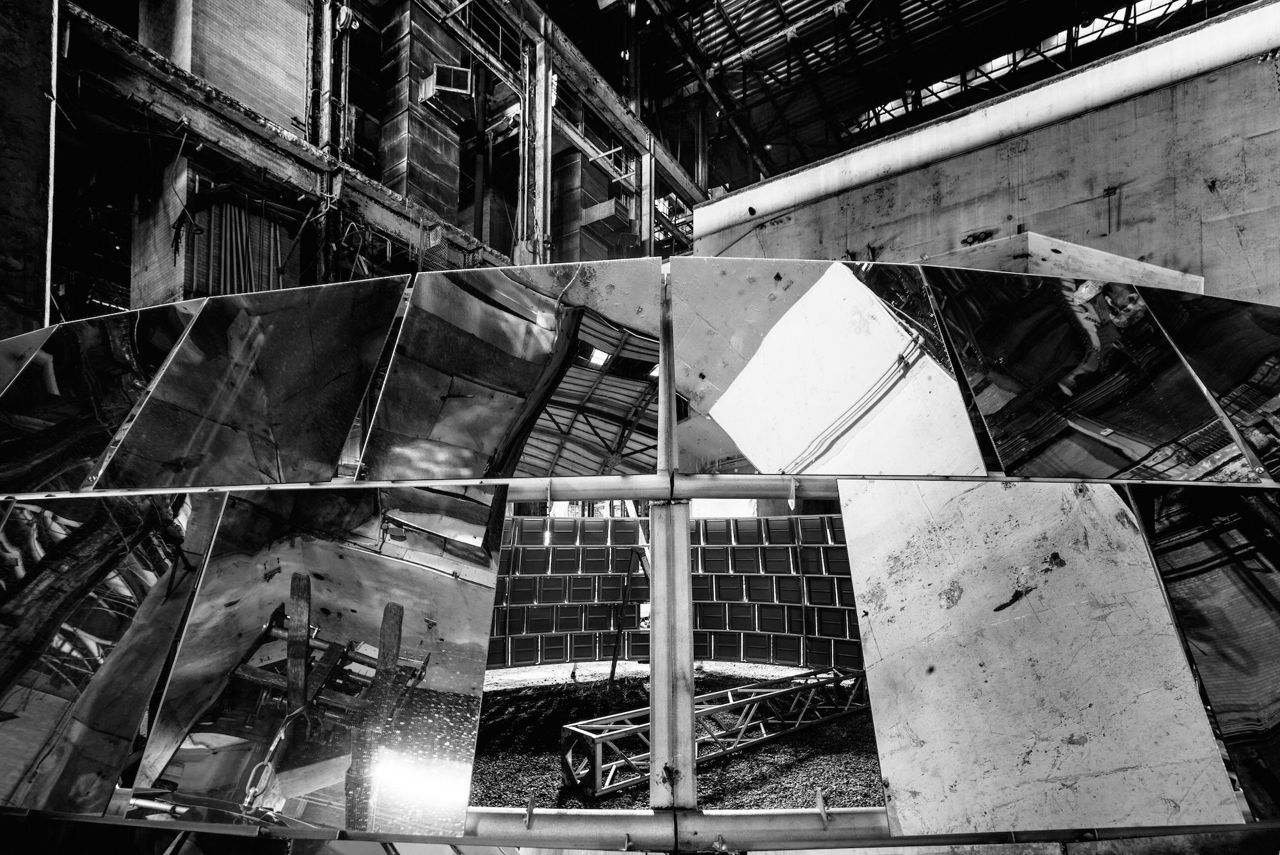 Here's how Luminato mounted a stunning eight-metre mirror ball inside an abandoned power plant