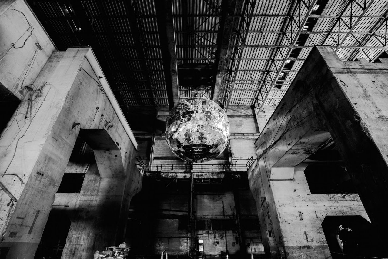 Here's how Luminato mounted a stunning eight-metre mirror ball inside an abandoned power plant