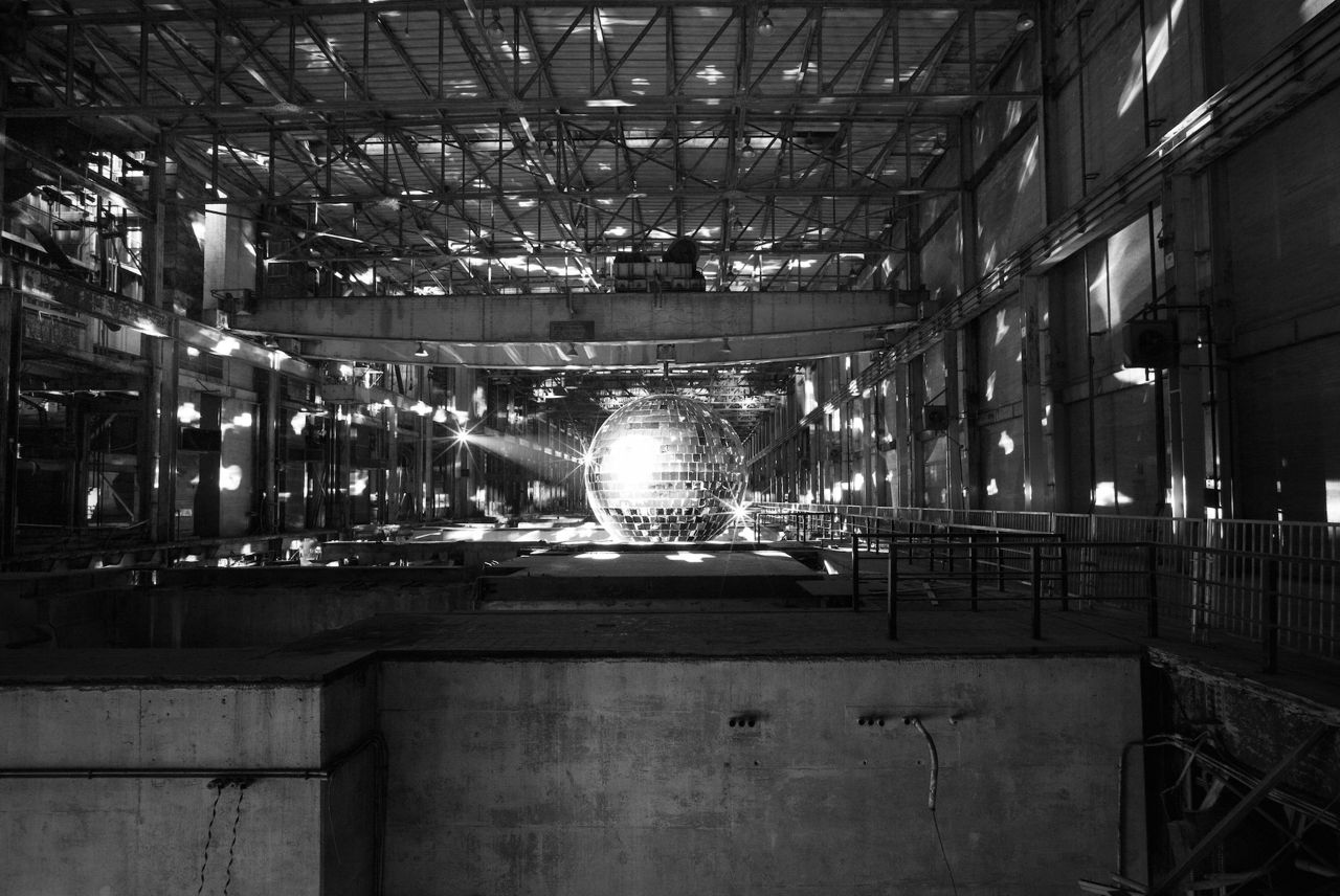Here's how Luminato mounted a stunning eight-metre mirror ball inside an abandoned power plant