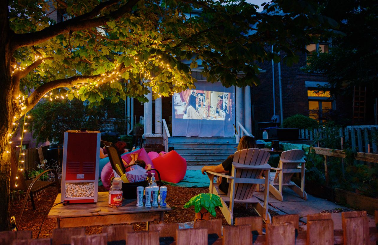 I set up a projector, bought a popcorn machine and transformed my yard into a neighbourhood movie theatre
