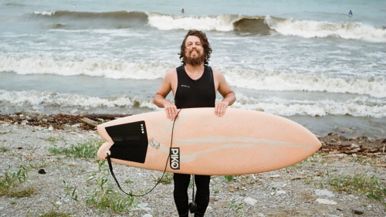 It takes a certain kind of crazy to go surfing in December