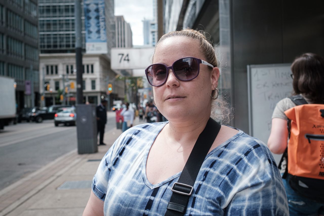 "It's kind of like everyone for themselves right now": What it's like in the lineup at a downtown passport renewal office