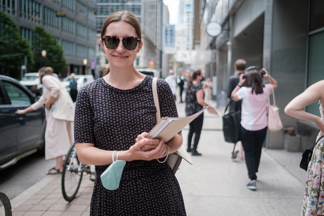 "It's kind of like everyone for themselves right now": What it's like in the lineup at a downtown passport renewal office