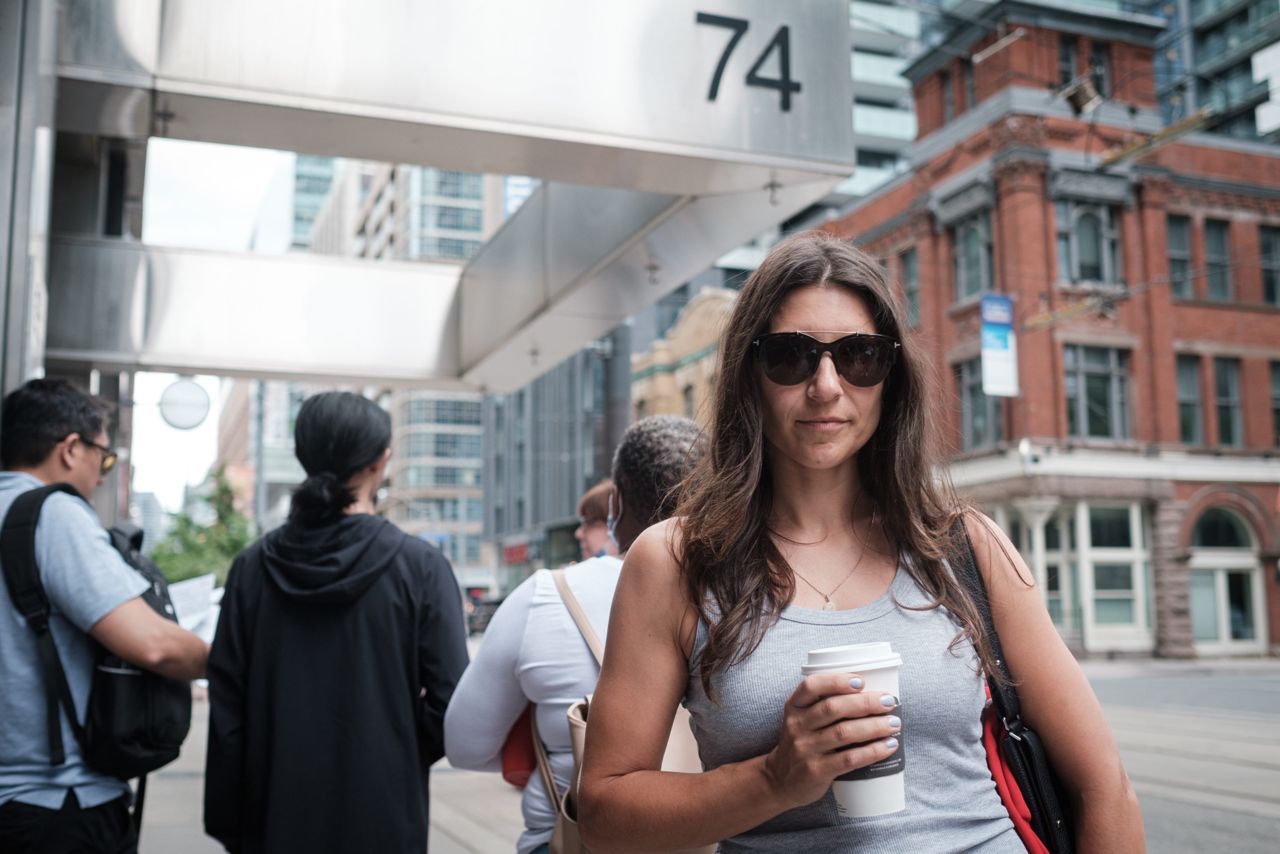 "It's kind of like everyone for themselves right now": What it's like in the lineup at a downtown passport renewal office