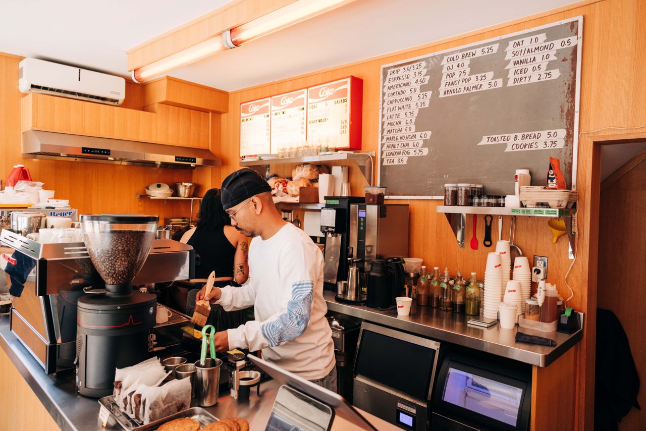 People work behind the counter at Made Rite, a cafe in Toronto