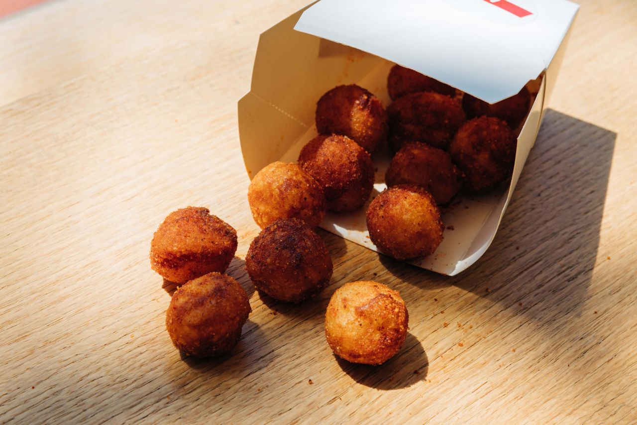 A takeout container of fried potato balls at Made Rite, a cafe in Toronto