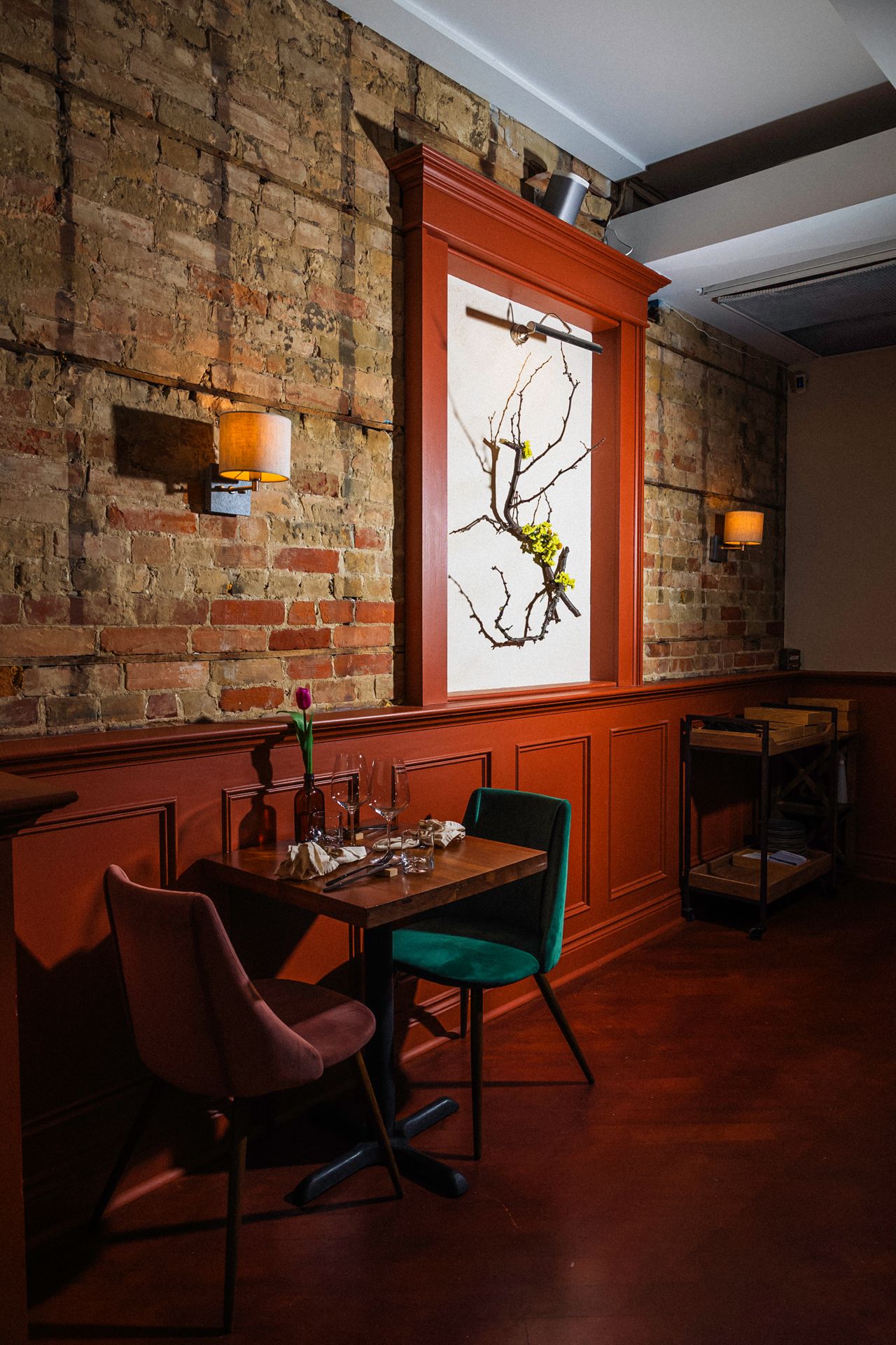 Two-top tables inside Radici Project, a Japanese Italian restaurant in Toronto