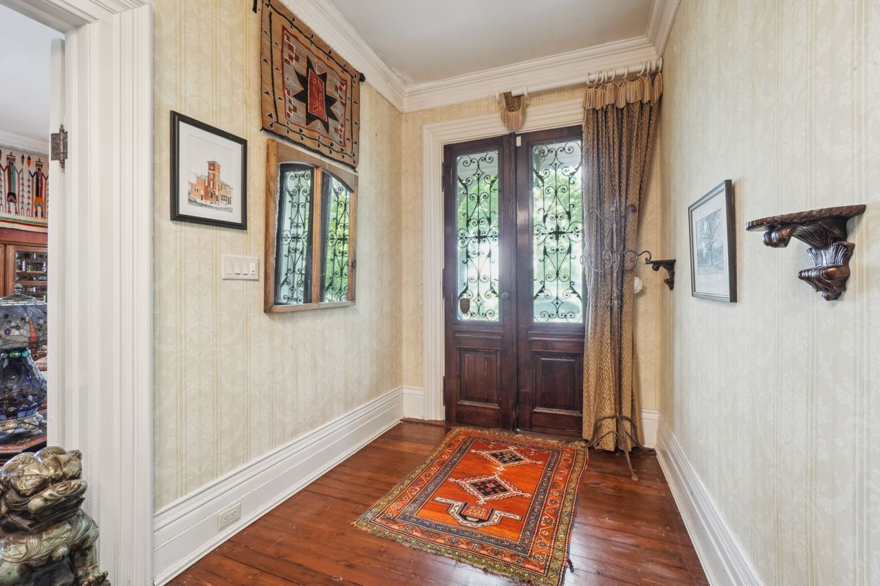 $2.3 million for a Milton heritage award winner with a dining room sarcophagus