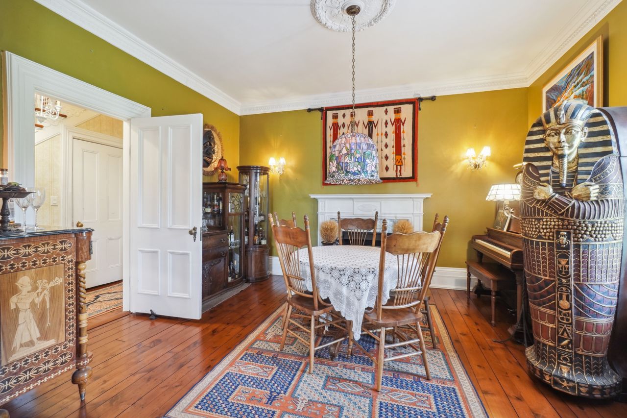 $2.3 million for a Milton heritage award winner with a dining room sarcophagus