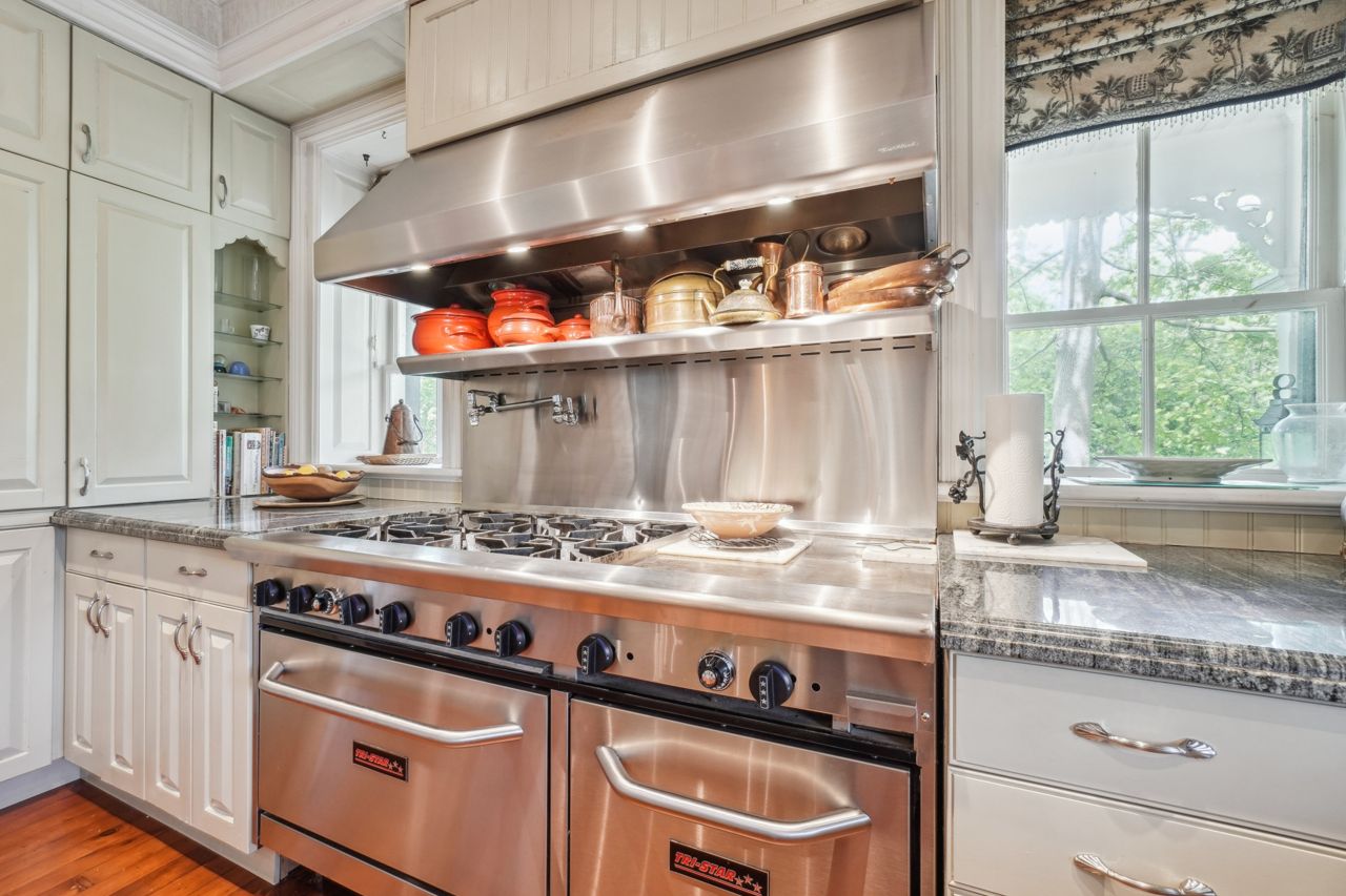 $2.3 million for a Milton heritage award winner with a dining room sarcophagus