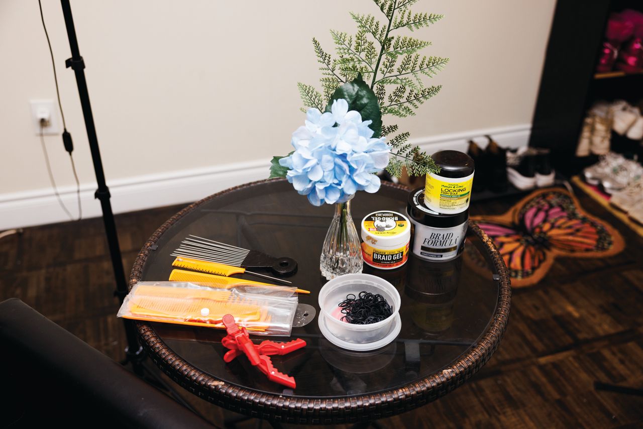 This painter and restaurant host makes $56,000 a year. How does she spend it?