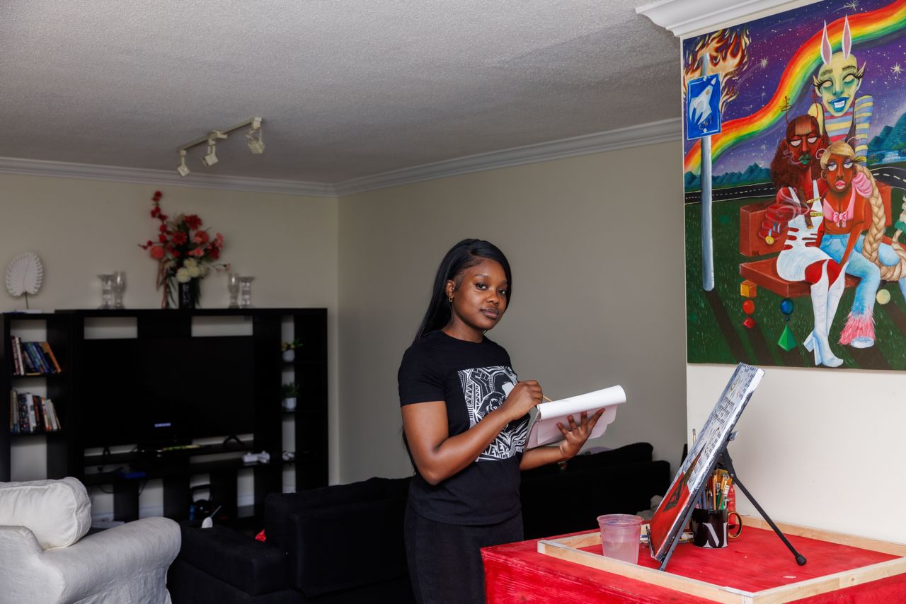 This painter and restaurant host makes $56,000 a year. How does she spend it?