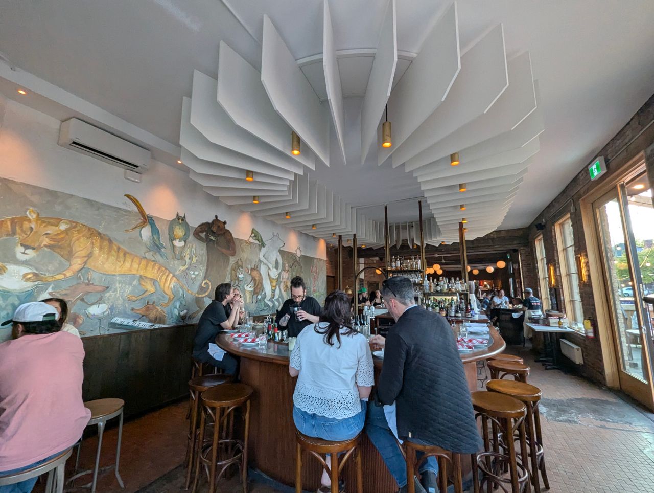The bar and dining room at Le Tambour Tavern, a restaurant in Hamilton, Ontario