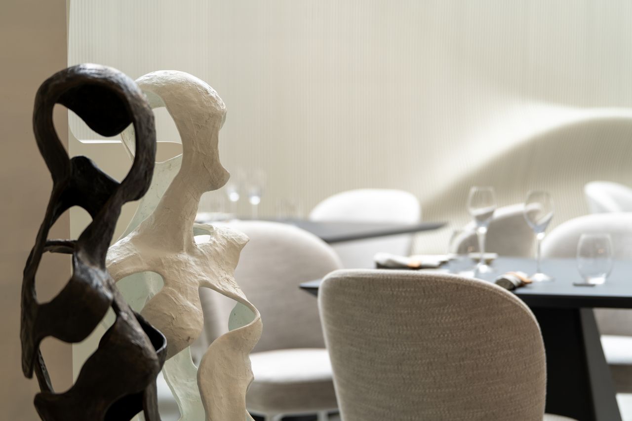 Sculptures in the four-table dining room at 1147 Ristorante