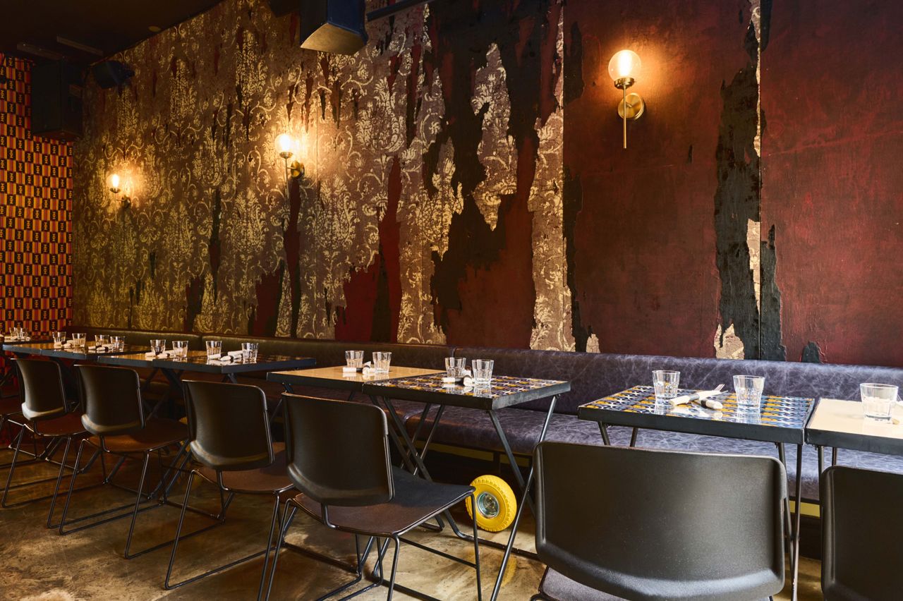 Banquette seating in the dining room of Harlem Restaurant in Toronto