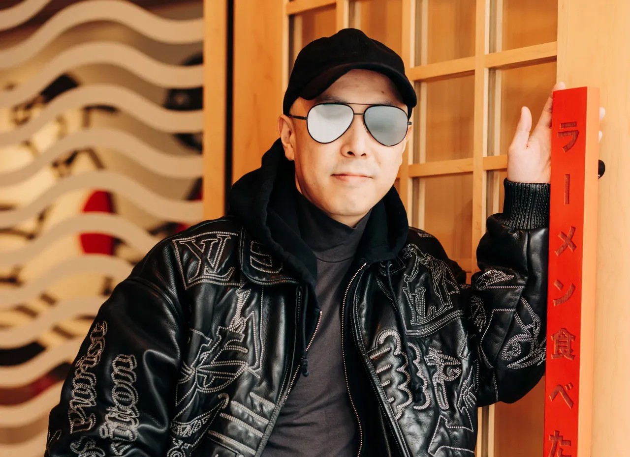Masaki Saito stands outside of his Yorkville ramen restaurant, Ramen Tabetai