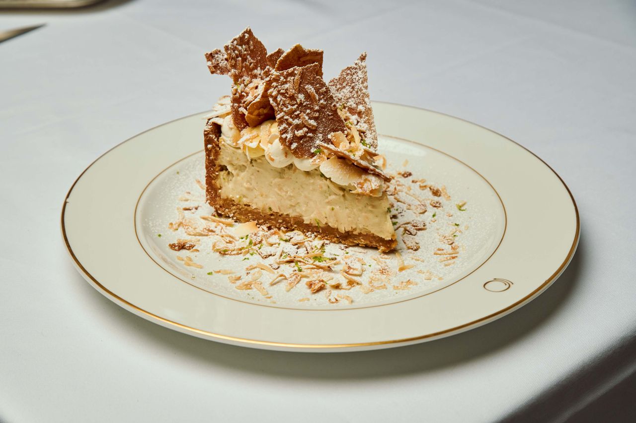 The Crema di Cocco layers coconut cream with toasted coconut and makrut lime on a nutty almond and coconut base