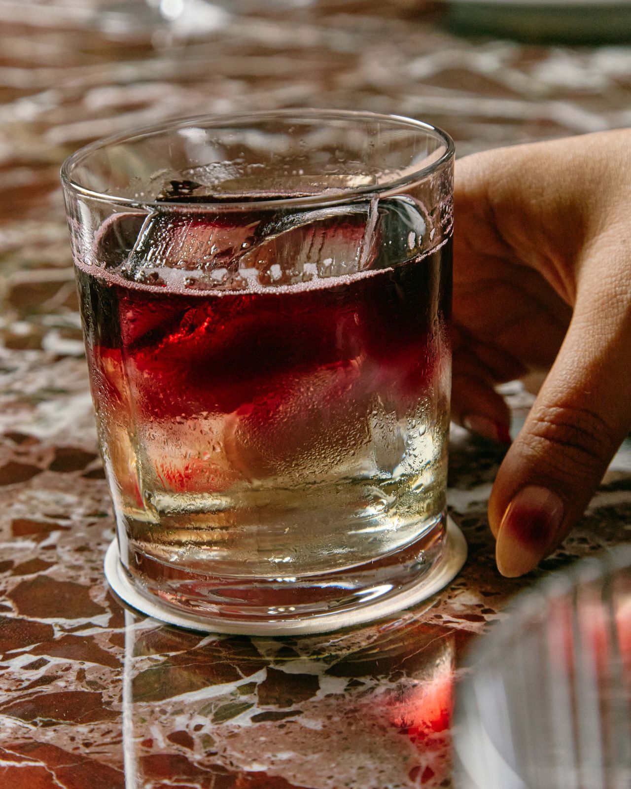 The Mezzo Mezzo is a clarified take on a New York sour made with Michter’s rye, Grappa di Barolo, spiced orange and whey, then finished with a float of Medici Lambrusco