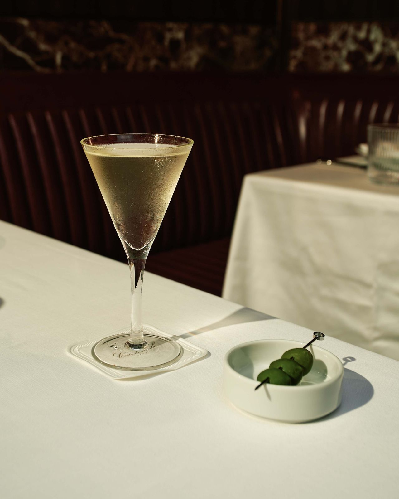 The Carlevale Martini blends Jindea Single Estate Gin, Champagne vermouth, Meyer lemon and a Castelvetrano olive for a bright, citrus-laced finish. $50