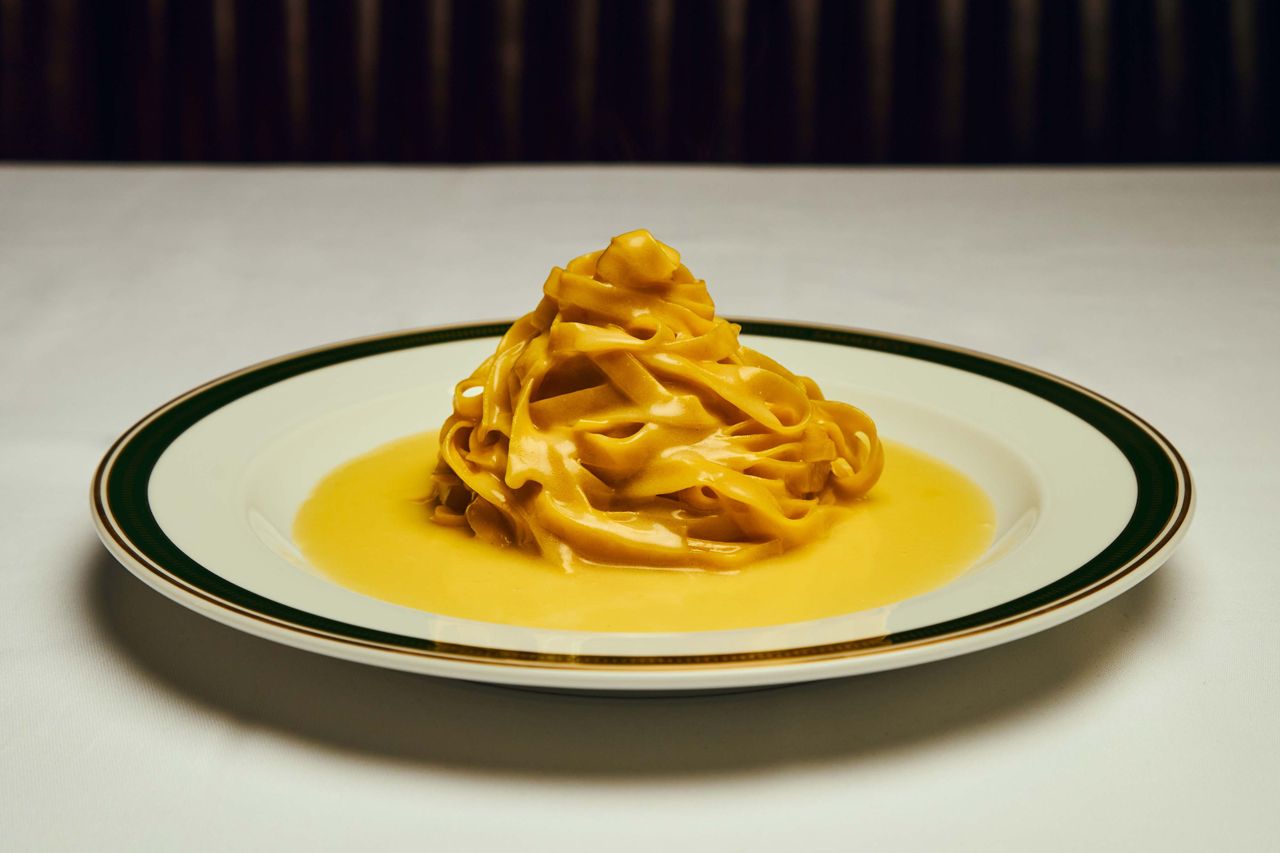 A plate of Fettuccine alla Scrofa Cento Uova