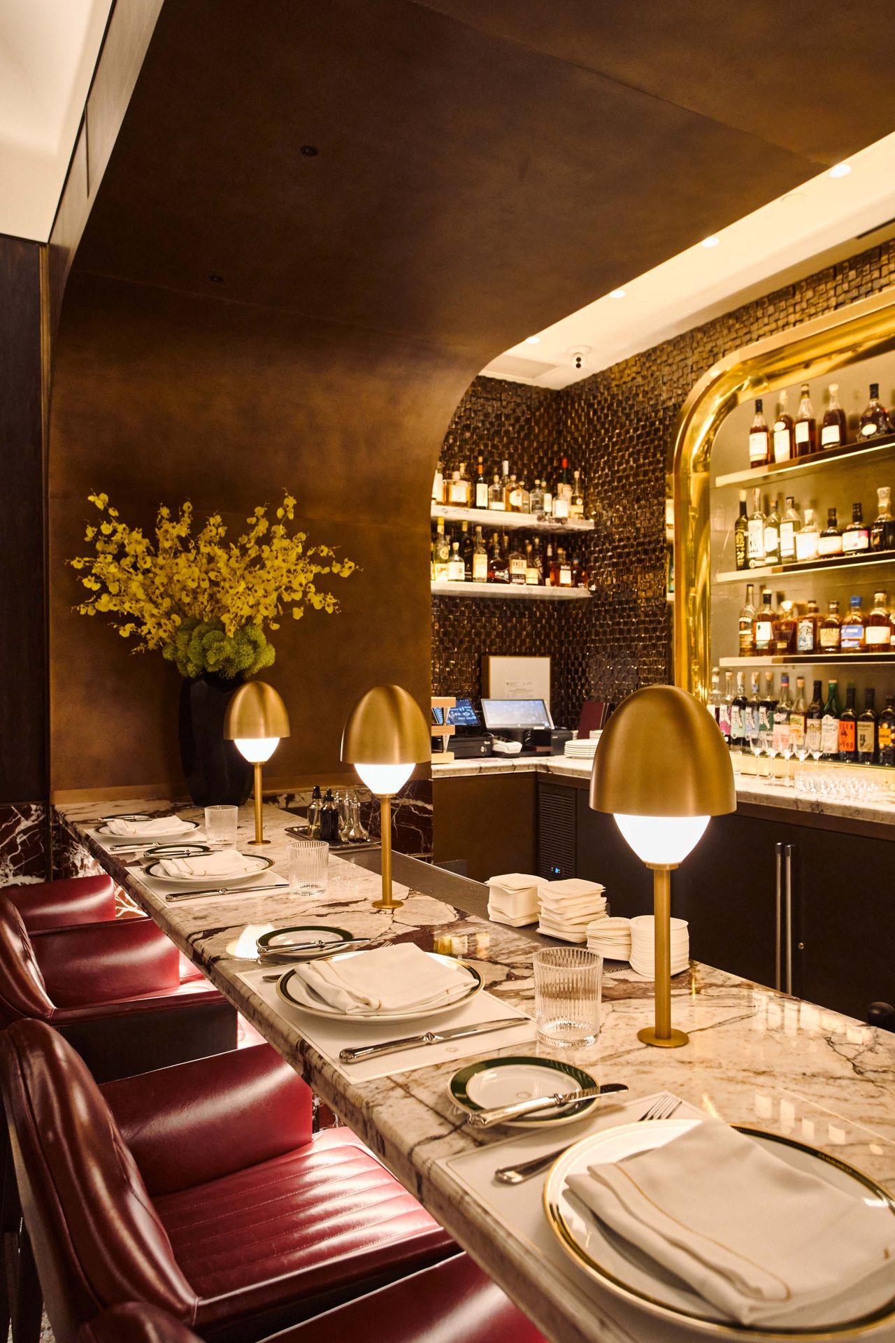 A closeup of the bar, set for service, at Bisteccheria Sammarco