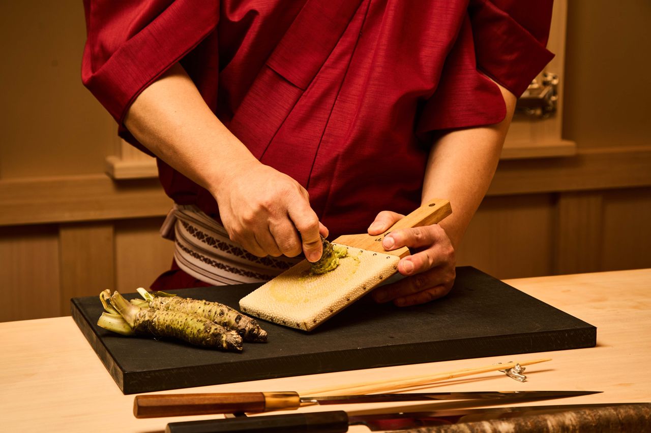 Fresh wasabi root imported from Japan is grated to order on shark skin