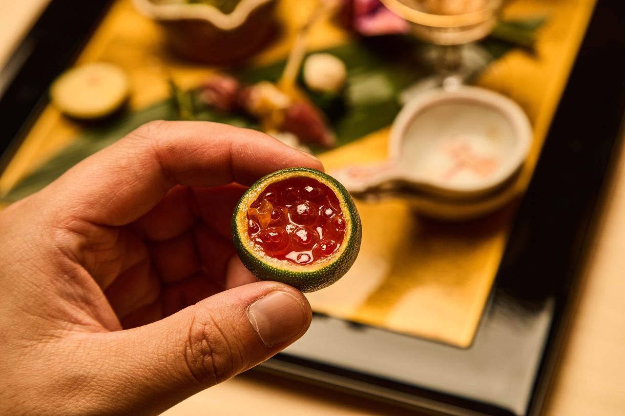 Salmon roe in hollowed-out citrus fruit