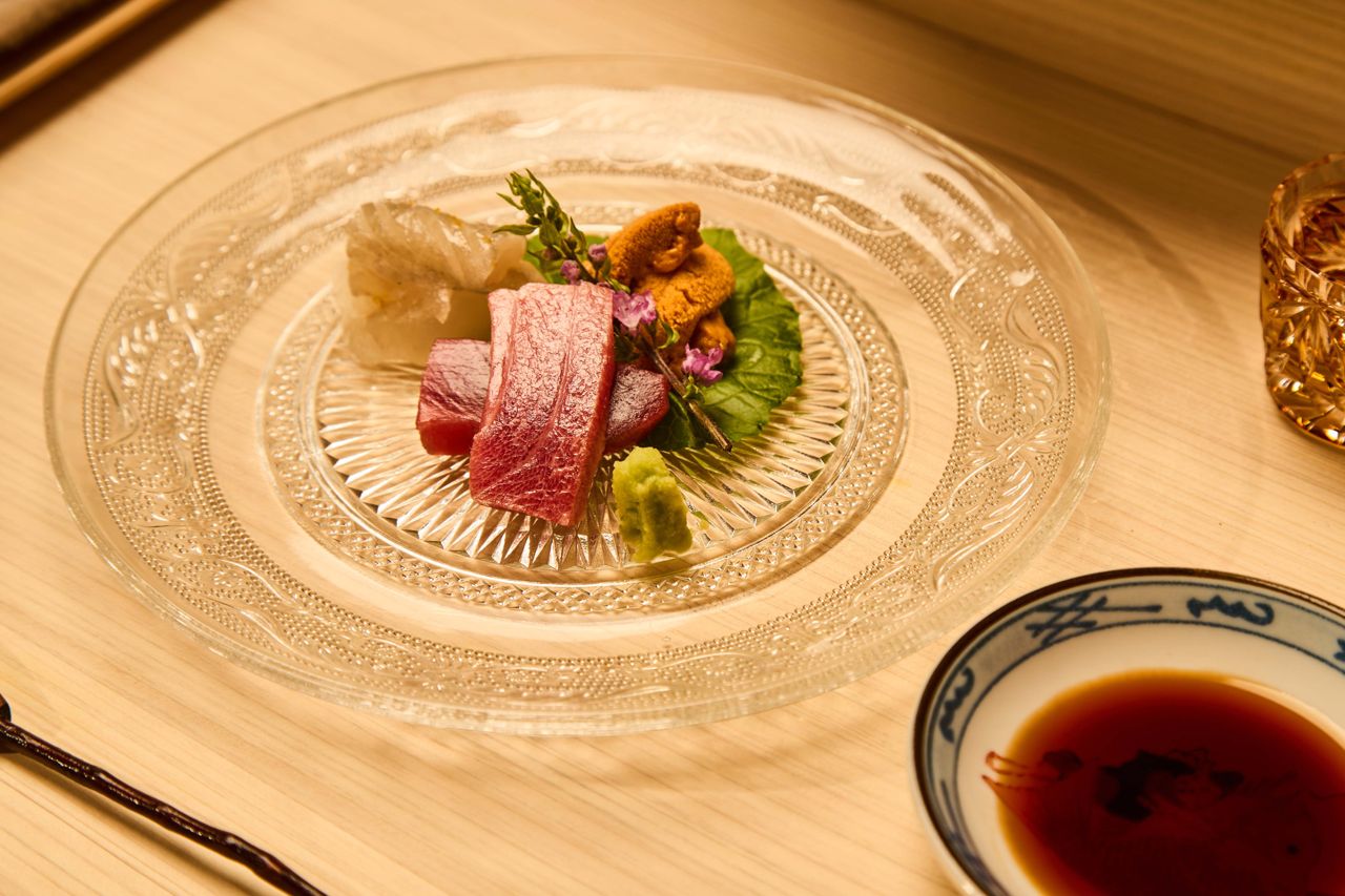 The Sashimi course might start with delicacies like fresh uni from Japan with flounder, served two ways
