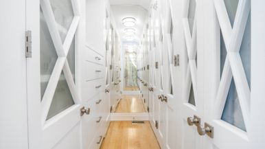 $2.5 million for a Rosedale Tudor with a staircase made of curved glass