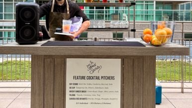 This sort-of-secret rooftop patio serves cocktail pitchers and boozy ice cream sandwiches