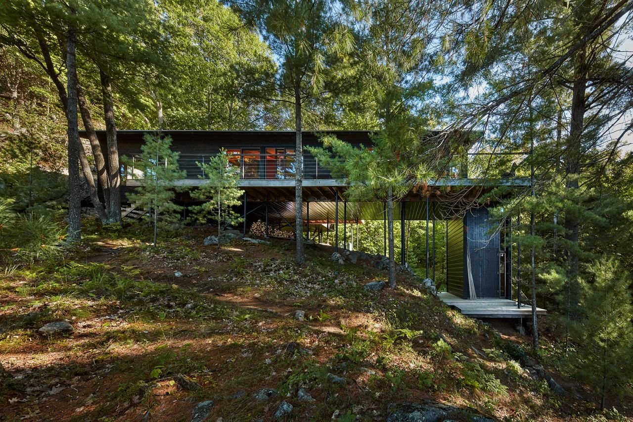 Inside a secluded $1.9-million Haliburton cottage standing on stilts among the trees