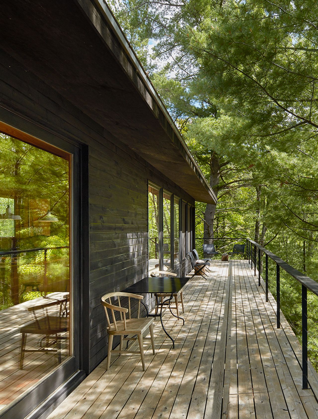 Inside a secluded $1.9-million Haliburton cottage standing on stilts among the trees