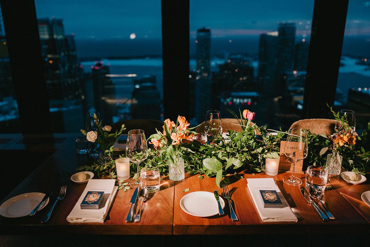 Table settings at Caroline and Mauricio's Canoe wedding