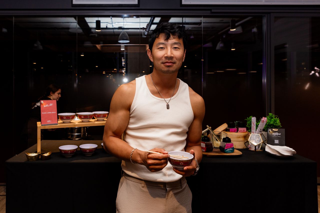 Simu Liu enjoying some noodles