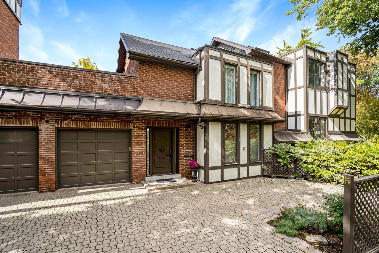 $2.5 million for a Rosedale Tudor with a staircase made of curved glass