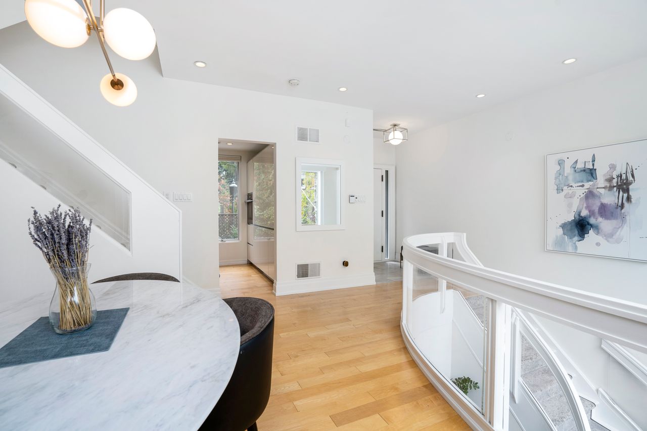 $2.5 million for a Rosedale Tudor with a staircase made of curved glass