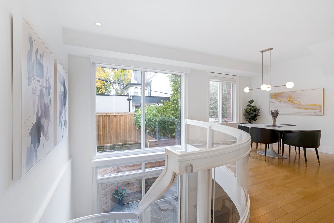 $2.5 million for a Rosedale Tudor with a staircase made of curved glass